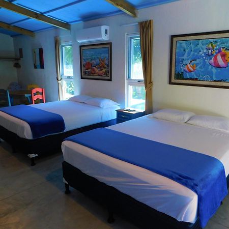 El Arrecife Martin Pescador Aparthotel Taxisco Habitación foto